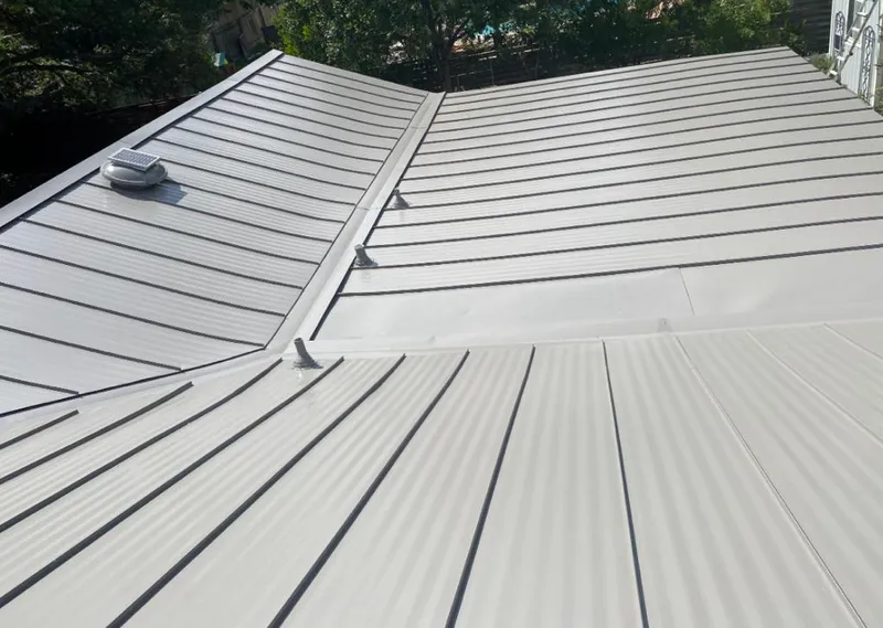 Solar attic fan installed on a metal roof for Roof Ventilation in Diamond Bar